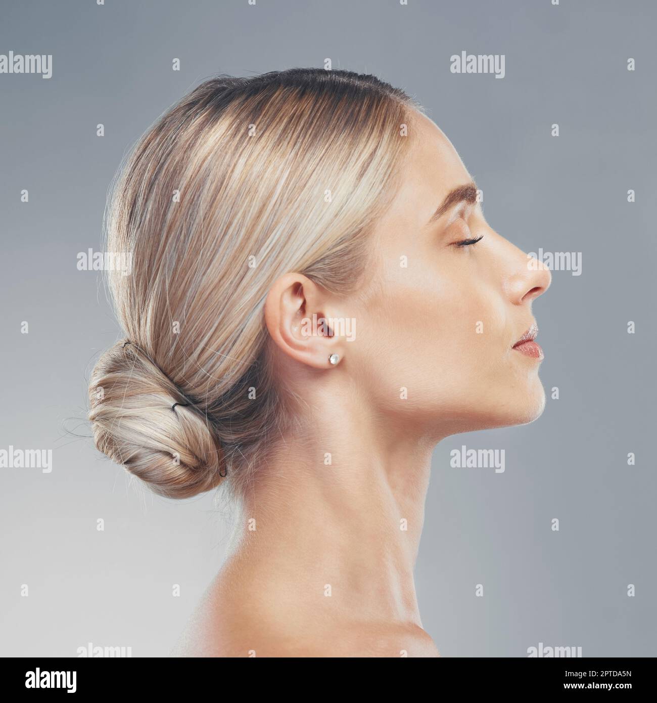 Beauty, profile and face of woman with eyes closed on gray studio
